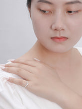 Load image into Gallery viewer, "Simple Lines" 18K set with natural white diamonds, V-shaped silk scarf style diamond ring