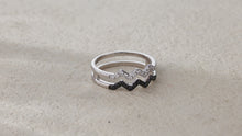 Load and play video in Gallery viewer, "Simple Lines" 18K set with natural black and white diamonds, linear double wave diamond ring